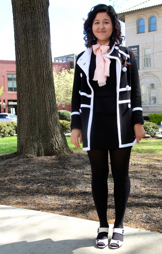 Rachel West, Chemistry major, wearing a coat from Macy's, and hand-me-down shirt, and shoes from DSW.